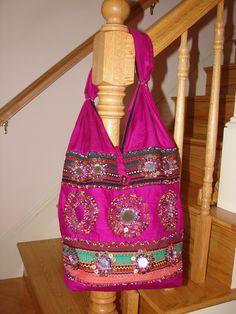 FABULOUS Purple Cotton Bohemian Shoulder Bag with Seed Bead and Mirror Decoration. You can use this beautiful should bag everyday or use it to go to the market. It has quite a bit of room inside and is very comfortable on the should as it is made from soft cotton fabric. The mirrors are accentually with the beautiful beadwork. PLEASE NOTE: One mirror is missing on the top row on the left on the front of the bag. It is barely noticeable and doesn't detract from it's beauty. Please feel free to co Beaded Bags For Everyday Use And Festivals, Everyday Beaded Bags For Festivals, Traditional Pink Beaded Bags, Bohemian Embellished Shoulder Bag For Festival, Bohemian Embellished Tote Shoulder Bag, Bohemian Embellished Travel Bags, Embellished Rectangular Bag For Festival, Bohemian Embellished Shoulder Bag, Rectangular Embellished Festival Bag