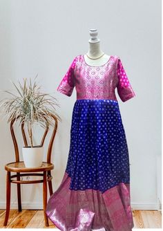 "Super Hit Traditional Color Combo, Blue and Magenta Pink Long Frock  Banaras silk fabric Ready Size 40 Can be altered to 36-44 Length- 56\" Occasion: party wear, function wear, Festival special Ships from a small business in Texas Materials: Silk, Banaras silk Please message the seller with any queries. WhatsApp: 732-859-7429 NOTE: Slight variation in color is possible due to how the camera captures the color. Colors and texture show differently in daylight vs indoor lights. Make sure you FAVOURITE my shop to get notified when new items are added!!" Blue Floor-length Gown For Eid, Semi-stitched Banarasi Silk Dress With Pallu, Pink Semi-stitched Art Silk Dress, Traditional Blue Floor-length Maxi Dress, Handloom Fitted Wedding Dresses, Pink Raw Silk Gown With Zari Work, Blue Handloom Kurta For Festivals, Blue Silk Lehenga For Party, Blue Silk Choli For Party