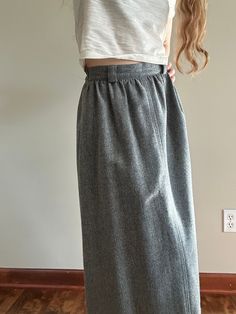 "Vintage Women's 100% Wool Heather Gray Maxi Skirt Tag reads size 8, but fits like a 0-2 Model is a size 4 and 5'4\"  100% Wool, has a lining.    Vintage items may contain minor flaws. Major flaws will be listed if present. Lighting and color of product may vary due to photo.  All vintage item are FINAL SALE and do not offer opportunity for a refund.  Thank you for shopping KicoVintage!" Midi Skirt For Daywear In Fall, Fall Daywear Skirted Bottoms, Classic High Waist Skirt For Fall, Classic High-waist Skirt For Fall, Fall Daywear Skirt With Pockets, Gray Lined Pencil Skirt Bottoms, Classic Relaxed Skirt With Elastic Waistband, Classic Skirt With Elastic Waistband, Classic Bottoms With Elastic Waistband And Relaxed Skirt