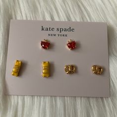 Kate Spade Dashing Beauty 3-Pair Earrings Set *New With Tags *Gold-Tone Stud Earrings *(3) Pairs Of Earrings: -Yellow Enamel Taxi Cab -Gold-Tone Pretzel -Gold-Tone Red Crystal Apple *Includes (1) Kate Spade Dust Bag Crystal Apple, Kate Spade Earrings Stud, Apple Earrings, Taxi Cab, Preppy Room, Kate Spade Earrings, Earrings Ear, Spade Jewelry, Kate Spade Jewelry