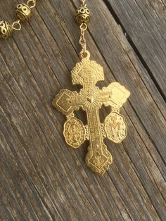 This listing is for the rosary pictured. It is made with gold tone 8mm metal beads, a Pieta centerpiece and a Pardon crucifix. The Rosary, Metal Beads, Rosary, The Golden, New England, Gold Tones, England, Beads, Gold