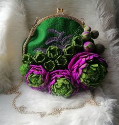 "\"Felted hand bag, Wool bag for women, Hand bag for women, Flowers purse, Felted bag, Felted flower bag, Green bag, Round bag, Vegan purse, Shoulder bag, Bag with flowers decor, Rose bag, Purple bag, Eco bag\". Made-to-order item! Proseccing time is 1-2 weeks! Free shipping worldwide! I'm in love with creating this unique purses. All my bags are completely handmade by wet felting technique. I use only finest Italian or Germany merino wool, soap, water and hands (my hands) to create this small m Elegant Green Pouch Satchel, Handmade Formal Pouch Shoulder Bag, Handmade Pouch Shoulder Bag For Formal Occasions, Green Handheld Bag For Gifts, Green Handheld Bag For Gift, Elegant Flower-shaped Shoulder Bag For Daily Use, Elegant Flower Shaped Shoulder Bag For Daily Use, Green Shoulder Evening Bag As Gift, Gift Tote Evening Bag With Handles