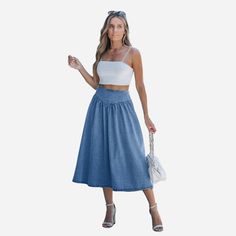 Effortlessly cool and undeniably chic, our Denim Midi Skirt is the versatile wardrobe staple you've been searching for. Crafted from premium denim with just the right amount of stretch, this skirt strikes the perfect balance between comfort and style, making it a go-to choice for any occasion. Product code: CAA02B4G021SS Casual Denim Skirt, Basque Waist, Stretch Denim Shorts, Versatile Wardrobe, Denim Maxi Skirt, Ladies Of London, Denim Midi Skirt, High Rise Denim, Casual Denim