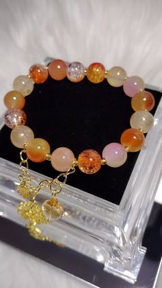 Sunset Serenade Crystal Glass Beads Bracelet with Gold Charms, Gold Chain, Crystal Heart Shape Glass Beads Charms. Each Charm is Random For Each Bracelet. Bohemian Crystal Bracelet With Heart Beads, Healing Beaded Charm Bracelet, Spiritual Crystal Bracelet With Heart And Round Beads, Heart Beaded Bracelets, Glass Beads Bracelet, Bracelet Sets, Gold Charms, Beads Charms, Glass Beaded Bracelets