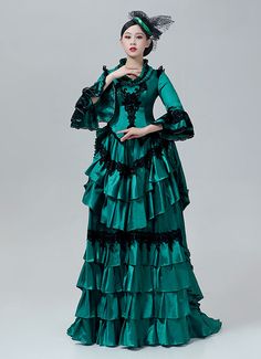 18th Century Victorian Bustle Dress Rococo Marie Antoinette Costume  Color:Green  Material: This dress made of High Quality Satin, soft,smooth and comfortable to wear  Sleeve Length:  Long Sleeve  Dresses Length:Floor Length  Neckline:  Square Collar  Decoration: Ruffles + Lace  Package Includes:  Dress + Hat    The length of skirt about 45 inches (114 cm) long from waist to hem regardless of size. This dress is pictured with a 6-hoop skirt Petticoat underneath to achieve the look. Petticoa Victorian Bustle Dress, Marie Antoinette Dresses, Marie Antoinette Costume, Victorian Bustle, Baroque Dress, Antoinette Dress, Bustle Dress, Hoop Skirt, Dress Hat