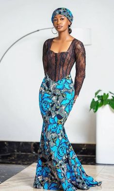 Here's a lovely and Unique Corset dress for you, perfect for special occasions like, formal occasions, weddings, birthday party and other events.  Made with 100% African Wax cotton.  This piece can be made in other prints, kindly contact Us for fabric options. Measurements needed: -Burst -waist -hip -thigh -height -Shoulder -Sleeve length Care instructions:  Wash with mild soap. Do not bleach. Do not machine wash Blue Lace Party Corset Dress, Blue Lace Corset Dress For Party, Elegant Long Sleeve Corset Dress For Prom, Fitted Blue Ankara Maxi Dress, Fitted Lace Maxi Dress For Wedding Guest, Fitted Lace Maxi Dress For Party, Black Ankara Party Dress, Black Ankara Fabric Party Dress, Fitted Black Evening Dress For Wedding Guest