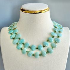 This Double Layered Necklace Features Real Turquoise Faceted Stones With 18kt Gold Plated Details. Pair With A White T-Shirt Or Fancy Dress. Chain 17"L (8.5"L When Clasped) New Condition, Never Worn Elegant Round Amazonite Necklace, Elegant Double Strand Turquoise Necklace, Turquoise Round Beads Emerald Necklace, Elegant Double Strand Blue Turquoise Necklace, Double Strand Necklace, Real Turquoise, Layered Necklace, Strand Necklace, White T Shirt