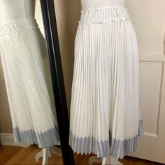 Beautiful Clu White Pleated Long Skirt With Blue Bottom; Elastic Waist Band; Lined; New Without Tag. Length: 28” Fabric: 100% Polyester Care: Dry Clean Only Made In Usa White Pleated Midi Skirt For Spring, White Midi-length Pleated Skirt For Spring, White Flowy Pleated Midi Skirt, Elegant Pleated Bottoms For Brunch, White Fitted Midi-length Pleated Skirt, White Midi Skirt For Spring, White Pleated Hem Bottoms For Spring, Spring Chic White Pleated Skirt, Spring White Bottoms With Pleated Hem