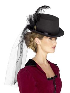 The steampunk style inspires this Victorian top hat which comes with veil  broach  and feathers detailing. Accessorize this with your favorite costume to give a finishing touch. Make a fashion statement and get noticed at the Victorian-themed or Halloween parties.    

Product Features:  
Features ladies Victorian top hat with veil  feathers and brooch  
Perfect for Halloween themed party; dyes may not be colorfast  
Adult size costume; not for children  
Costume comes in display card  
Warning: Steampunk Fancy Dress, Fancy Dress Womens, Top Hats For Women, Fancy Dress Ideas, Victorian Top, Moda Steampunk, Headband Veil, Ladies Fancy Dress, Steampunk Top Hat