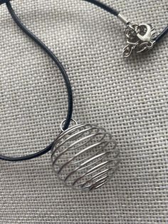 "silver crystal cage necklace. includes: one crystal cage (choice of size) and 16\" leather cord (w/ 2\" chain extender)." Crystal Cage Necklace, Crystal Cage, Cage Necklace, Caged Necklace, Chain Extenders, Silver Crystal, Leather Cord, Pendant Necklaces, Necklace Etsy