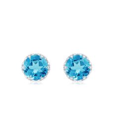 Product Details Enhance your Beauty with these Solitaire Stud Earrings embellished with Round Shape Swiss Blue Topaz set as Solitaire in lotus basket Setting and round shape Diamond is set in Decorative Setting. Product Information SKU SHP-EARRINGS062197127 Length 5.5 mm Width 5.5 mm Height 4 mm Weight 1.06 gm (Approximate) SWISS BLUE TOPAZ INFORMATION No.of Stones 2 Pieces Total Weight 1.15 Carat (Approximate) Dimension(approx) Round-5X5 mm-2 Pcs Color Blue Cut Brilliant Shape Round Setting Typ Blue Topaz Earrings With Diamond Accents, Blue Topaz Earrings With Brilliant Cut As A Gift, Blue Round Topaz Earrings, Blue Topaz Blue Earrings, Blue Topaz Round Earrings, Blue Topaz Earrings With Gemstone Accents, Blue Fine Jewelry Earrings With Accent Stones, Blue Cubic Zirconia Earrings With Gemstone Accents, Blue Earrings With Cubic Zirconia Gemstone Accents