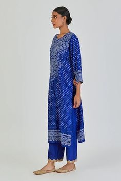 Royal blue three fourth sleeves straight kurta with all over bundi with different patterns of bandhani, dots, chaubundi, leheriya and paisley motifs. Paired with a palazzo with embellished lace embroidered scalloped hem. - Aza Fashions Blue Block Print Palazzo Set With Long Sleeves, Traditional Blue Block Print Palazzo Set, Blue Palazzo Set With Printed Motifs And Straight Kurta, Blue Bandhani Print Palazzo Set For Eid, Festive Blue Bandhani Print Palazzo Set, Blue Palazzo Set With Printed Motifs For Navratri, Blue Bandhani Print Palazzo Set For Festive Occasions, Elegant Bandhani Print Kurta For Eid, Navratri Blue Palazzo Set With Block Print