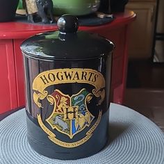 a hogwarts kitchen canister sitting on a table