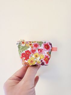 "100% Cotton. Lightweight. From the world famous Liberty Fabrics with a silk-like touch, unique print quality and striking color vibrancy. Exclusive print. Printed in Japan This mini pouch is great size for a couple of small items. Size is 3W / 2\"H / 1\"D Flat bottom shape. Fabric is Liberty of London Tana Lawn. The pouch opens with golden color zipper.(High quality YKK zipper) It comes with a velvet ribbon on one side. Lined inside with pretty baby-pink color cotton. Please, Hand wash. Or cool Cute Multicolor Cosmetic Bag As Gift, Cute Multicolor Cosmetic Bag Gift, Cute Multicolor Cosmetic Bag With Removable Pouch, Cute Multicolor Cosmetic Bag With Zipper Pouch, Pink Pouch Coin Purse As Gift, Multicolor Pouch Cosmetic Bag As Gift, Pink Pouch Coin Purse Gift, Multicolor Cosmetic Bag With Zipper Closure As Gift, Cute Multicolor Pouch For Gift