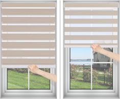 two windows with blinds open to the outside