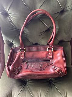 Vintage Medici, Firenze brown leather bag with brass hardware and zip closure. Green cloth monogrammed lining with two slide and one zip pocket. Double round handles and a small zip pocket outside. Four brass feet on the bottom. Nice patina on the leather. The bag is in great vintage condition with signs of wear as seen in the photos. 13 x 7 x 5" wide, handles drop 9" Italian Leather Bags, Brown Leather Bag, Top Handle Bags, Vintage Italian, Vintage Bags, Brass Hardware, Vintage Leather, Italian Leather, Purses And Handbags