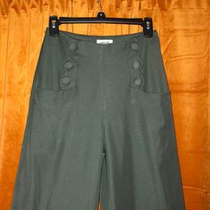 Wide Leg Dress Pants With Cute Scallop Pocket And Button Side Detail. Side Zipper. Size Small/ 4, Length Of 44 In From Waist To Bottom Leg Hem, 12 Inch Wide Leg. Unworn, Nwt. From Unique Vintage, Royal Monk Tags. Dry Clean Only, 100% Poly Spring Wide Leg Pants With Button Cuffs, Fitted Pants With Button Cuffs For Spring, Chic Wide Leg Pants With Button Cuffs For Spring, Fitted Pants With Button Closure For Spring, Vintage High Waist Non-stretch Pants, Green Wide Leg Pants With Button Closure, Solid Summer Pants With Buttons, Summer Solid Pants With Buttons, Knee-length Summer Bottoms With Buttons