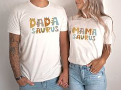 Introducing our super cute dinosaur theme birthday t-shirts. These shirts are high quality and made with 100% soft ringspun cotton for very comfortable wear.   NB: We have multiple options for Mom and Dad in the listings drop-down menu, please double-check you chose the correct one. The Rabbit Skins NATURAL infant tee sizes 6, 12, 18, and 24 months are slightly darker than the Bella Canvas toddler, youth, and adult shirts. We currently do not have the bodysuit in the natural color. The shirt tha Mamasaurus Shirt, Dinosaur Theme Birthday, Dinosaur Family, Matching Birthday Shirts, Birthday T Shirts, 1st Birthday Outfit, Dinosaur Theme, 1st Birthday Outfits, Birthday Tee