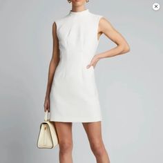 Timeless Off-White Shift Dress. Size 4. Tags Still On. Perfect For Standing Out At Office/Cocktail Events. White A-line Cocktail Dress, Classic Fitted Mini Dress For Wedding, Classic White Mini Dress For Party, Chic White A-line Mini Dress, Elegant Fitted White Mini Dress, Classic White Fitted Mini Dress, Classic White Mini Dress For Evening, White Knee-length Mini Dress For Evening, White Knee-length Evening Mini Dress