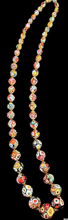 "ERCOLE MORETTI MILLEFIORI BEADS from the 1940's old vintage stock that originated from the factory in Italy. Making of a millefiori pattern is a multi-step process, but it all starts with a glass rod prepared in a special way. It contains multiple layers of semi-liquid glass paste applied one on top of another around the cylindrical rod. Each layer is molded to have a certain shape (usually star or flower-like) and color. The preparation continues as the resulting multi-layered rod is stretched Multicolor Retro Jewelry For Vintage Collection, Vintage Single Strand Jewelry For Wedding, Vintage Single Strand Wedding Jewelry, Retro Multicolor Wedding Jewelry, Vintage Multicolor Wedding Jewelry, Retro Multicolor Jewelry For Wedding, Multicolor Retro Jewelry For Wedding, Mid-century Handmade Wedding Jewelry, Vintage Multicolor Single Strand Necklace