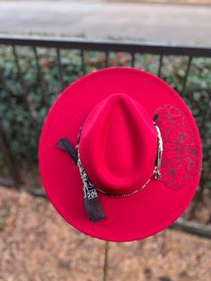 Be the life of the rodeo in this gorgeous boho red hat featuring a bull, poppies, and playful longhorns. Add this accessory to your wardrobe for a unique western touch. Red Flat Brim Hat For Fall, Red Western Fedora For Kentucky Derby, Red Adjustable Flat Brim Fedora, Red Western Hat For Fall, Western Style Red Fedora With Short Brim, Red Western Fedora With Short Brim, Western Red Fedora Felt Hat, Red Western Fedora Felt Hat, Western Style Red Fedora Felt Hat