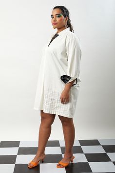 ivory shirt dress with roll up sleeves detailed with double stitch embroidery and upcycled fabric facing.
Components: 1
Pattern: Placement Stitch Embroidery
Neckline: Collared Neck
Sleeve Type: Full Sleeves
Color: Ivory
Other Details: 
Contrast cuffs
Occasion: Party - Aza Fashions Shirt Dress For Women, Embroidery Neckline, Embroidered Shirt Dress, Upcycled Fabric, Double Stitch, Ivory Dresses, Roll Up Sleeves, Fashion App, Stitch Embroidery