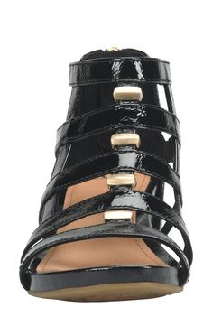 Patent leather crackles across the gladiator-inspired silhouette of this rear-zip strappy sandal lofted on a foam-cushioned wedge for walkable comfort. 2" heel; 1/2" platform (size 8.5) Cushioned footbed Leather upper and lining/rubber sole Imported Strappy Wedges, Black Wedge Sandals, Wedge Sandal, Strappy Sandals, Wedge Sandals, Patent Leather, Rubber Sole, Womens Sandals, Leather Upper