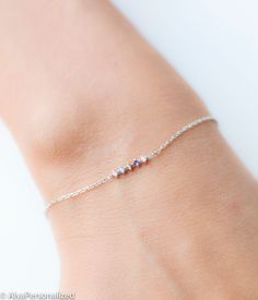 Birthstone bracelet can be made with 1-2-3-4-5-6-7 or 8 stones. Personalized jewelry can be a lovely gift for your loved ones...♡ ► FEATURES; Material Options: 925k Sterling Silver & Rose Gold Filled Over Silver & Yellow Gold Filled Over Silver Length : Standart length is 6.5''+0.5'' extention chain. ❥ I can adjust your bracelet length to your demands, please add me a note during check out if you wish a different bracelet length. Birthstones: Please see all birthstone color options in th Dainty Mother's Day Charm Bracelet, Birthstone Bracelet For Mom, Sterling Silver Bracelet For Best Friend, Dainty Sterling Silver Bracelets For Birthday, Dainty Sterling Silver Bracelet For Birthday, Silver Dainty Birthstone Bracelets, Silver Dainty Crystal Bracelet With Birthstone, Dainty Silver Birthstone Bracelets, Dainty Crystal Gemstone Bracelet For Gift