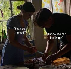 two women are preparing food in the kitchen