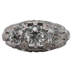 an antique three stone diamond ring