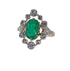 an antique emerald and diamond ring