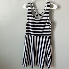 Nwot Sleeveless Summer Dress By H&M. Flowy Skirt. Cottony Stretch Material. Partial Open Back With A Cross Cross. Navy Blue And White Stripes. Pull On Dress. Such A Classic Style! About 35 Inches From Shoulder To Hem. Tried On, But Never Worn. Comes From A Smoke Free Home Casual White Stretch Sleeveless Dress, H&m Stretch Dresses For Summer, Casual Stretch Dresses From H&m, Stretch Summer Dresses By H&m, H&m Stretch Summer Dresses, Summer Stretch Dresses By H&m, Casual Stretch Dresses By H&m, H&m Casual Stretch Dresses, Casual Fitted Striped Sleeveless Dress