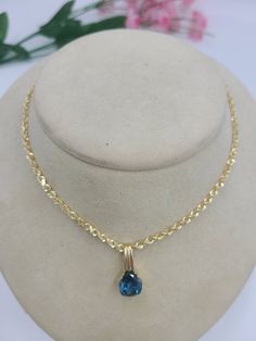 "For Sale: (1) k719 Gorgeous Solid 20\" Rope Chain with London Blue Topaz Pendant in 14kt Yellow Gold PLEASE READ ENTIRE DESCRIPTION BEFORE PURCHASING This is a lovely ladies 14kt yellow gold 20\" solid rope chain featuring a gorgeous oval cut, partially bezel set, London blue topaz.  Both chain and necklace are stamped 14k. Perfect for everyday wear or a night on the town.  Would be a nice anniversary, birthday, Christmas, Mother's Day or Valentine's Day gift for her.  Specifics: 14kt Yellow Gold  London Blue Topaz 20\" Solid Rope Chain, 3mm wide Weight: 20g/12.8dwt  ----------------------------------------------------------------------------------- Please be 100% sure of your purchase before buying, as we do not offer refunds. We are more than happy to provide any specific pictures or an Formal Blue Topaz Briolette Necklace, Gold Jewelry With Diamond-cut Blue Topaz, Gold Blue Topaz Jewelry With Diamond Cut, Yellow Gold Blue Topaz Briolette Jewelry, Yellow Gold Briolette Blue Topaz Jewelry, Gold Blue Topaz Birthstone Necklace, Yellow Gold Blue Topaz Necklaces With Diamond Cut, Gold Necklace With Blue Topaz Briolette, Yellow Gold Blue Topaz Jewelry With Diamond Cut