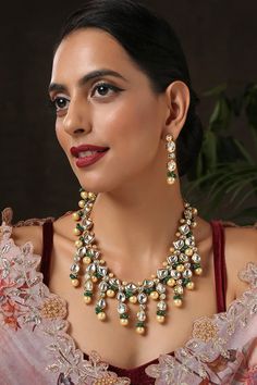 Gold plated necklace with green stone and kundan embellishment. Comes with earrings. - Aza Fashions Green Necklaces With Latkans For Party, Green Latkans Necklace For Party, Green Kundan Necklaces With Latkans, Elegant Green Kundan Necklace With Latkans, Green Kundan Necklace With 17 Jewels, Green Kundan Temple Necklace For Party, Elegant Green Temple Necklace With Latkans, Festive Green Kundan Necklace With Latkans, Elegant Green Bridal Necklace With Latkans