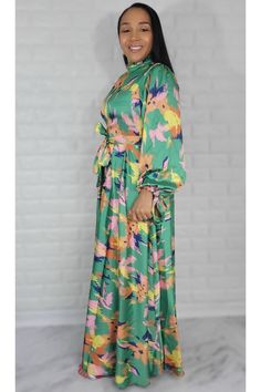 Material: Satin Style: Maxi Dress Long Sleeve Color: Green & Mul Fit True to size. The model is wearing a size Small with 36 Bust Size Recommended Small = 4/6 Medium= 8 Large= 10 XL = 12 1XL= 14 Vibrant Multicolor Print Dress For Garden Party, Green Floral Print Midi Dress, Green Floral Print Long Sleeve Maxi Dress, Green Long Sleeve Maxi Dress With Floral Print, Green Maxi Dress With Floral Print For Garden Party, Long Sleeve Green Maxi Dress With Floral Print, Vibrant Green Midi Dress For Spring, Chic Green Midi Dress With Vibrant Print, Multicolor Print Dress For Garden Party