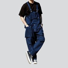 Introducing our 2023 Spring-Summer Collection safari-style baggy bib overalls a urban trend that's sure to turn heads!Why You'll Fall In LoveThis unique silhouette is tailored for the couture-forward who prefer making a statement. With its baggy fit and suspenders closure. you can enjoy a fashion take on the timeless safari-style overalls. Its vibrant colors and sanded finish promise a timeless. laid-back look that'll make you stand out from the crowd.Unmissable Highlights: Baggy Fit: Unparallel Utility Overalls With Side Pockets And Bib Front, Casual Blue Overalls With Suspenders, Blue Shortalls With Pockets, Summer Utility Style Relaxed Fit Shortalls, Cotton Overalls With Patch Pockets And Bib Front, Summer Utility Shortalls With Relaxed Fit, Trendy Bib Front Shortalls With Pockets, Utility Overalls With Patch Pockets, Baggy Utility Overalls