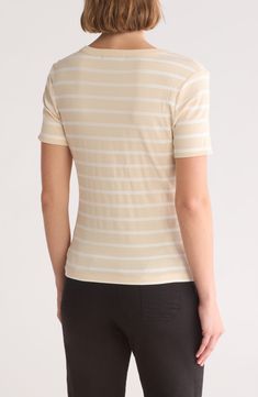 Refresh your essentials with a short-sleeve henley T-shirt constructed from a soft, stretchy ribbed knit. Button half placket V-neck Short sleeves 70% recycled polyester, 23% rayon, 7% spandex Machine wash, dry flat Imported Stretch Striped Short Sleeve T-shirt, Striped Stretch Short Sleeve T-shirt, Striped Stretch T-shirt With Short Sleeves, Casual Short Sleeve Summer Top, Casual Short Sleeve Crew Neck Top In Elastane, Casual Short Sleeve Top For Summer, Short Sleeve Elastane Top For Everyday, Everyday Short Sleeve Elastane Top, Everyday Short Sleeve Top