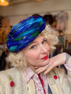 "For your consideration is a fabulous late 1950's/early 1960's blue wool felt beret completely covered with swirling feathers. Beautiful jewel toned cobalt blue and emerald green dyed feathers. The silk tag reads \"Lord & Taylor Salon\" and is a 22 1/2 size. Not a perfect circle- it's a slightly narrower in the front of the hat.  Measures 3\" tall Approx 9.5\" across Marked a 22.5  Condition is great. Upon close inspection there are some area where glue is visible. See pics.  Please ask any ques Grey Beret, Felt Beret, Large Brim Hat, Types Of Hats, Perfect Circle, Unique Hats, A Perfect Circle, Beret Hat, Christmas Knitting