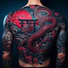 the back of a man with tattoos on his body and chest, covered in red flowers