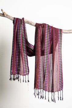 This retro striped scarf is as a fun and funky throwback to the hippie style and bohemian counterculture of yesteryear. With a variety of colors and patterns accented by dots and stripes, this unique lightweight scarf is a perfect colorful accent to any outfit. Which one will you get? Bohemian Woven Scarves One Size, Bohemian Woven Cotton Scarves, Bohemian Woven Scarf, Bohemian Multicolor Cotton Scarves, Multicolor Woven Scarf One Size, Hippie Multicolor Scarf One Size, Multicolor Woven Scarves One Size, Multicolor Bohemian Scarves For Festivals, Bohemian Multicolor Scarf For Festivals