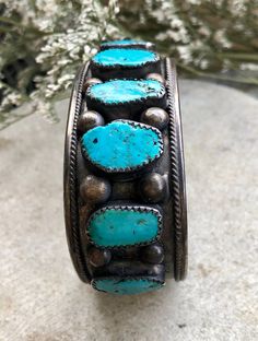 Circa Raw Sleeping Beauty Turquoise Sterling Silver Native American Vintage Antique Cuff Bracelet has lots of beautiful patina Face measures 1 inch wide inner diameter of 6 inches plus a 1/2 inch gap, slightly adjustable Adjustable Turquoise Bangle For Collectors, Antique Turquoise Bangle Cuff Bracelet, Handmade Turquoise Vintage Cuff Bracelet, Adjustable Turquoise Vintage Bangle, Antique Turquoise Adjustable Bracelet, Vintage Turquoise Bangle Cuff Bracelet, Antique Adjustable Turquoise Bracelet, Adjustable Turquoise Vintage Cuff Bracelet, Adjustable Vintage Turquoise Cuff Bracelet