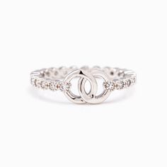 Interlocking ring with two circular designs, symbolizing grandmother-granddaughter bond, crafted from S925 sterling silver Elegant Hypoallergenic Stackable Rings For Promise, Elegant Nickel Free Round Band Ring, Elegant Nickel-free Round Band Ring, Classic Infinity Jewelry For Promise, Silver Infinity Stackable Rings For Promise, Silver Infinity Jewelry With Ring Detail, Silver Infinity Ring Jewelry, Hypoallergenic Promise Stackable Round Rings, Hypoallergenic Infinity Ring For Anniversary