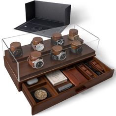 an open drawer with many different items in it