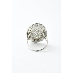 Elegant example of the Edwardian era handmade in platinum with an intricate pierced open work & filigree design.  The total diamond weight is approximately 4.90 carats.  The ring is a US size 7 and it can be sized.  Dimensions reference the ring size and are not specific to the ring itself. Antique Platinum Diamond Ring With Diamond Accents, Antique Diamond Ring With Center Stone, Victorian Diamond Ring In White Gold, Victorian White Gold Diamond Ring, Antique Platinum Ring In Diamond White, Antique Diamond White Ring With Center Stone, Antique Platinum Rings In Diamond White, Victorian Style White Diamond Ring, Victorian White Diamond Ring In Platinum