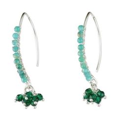 Designed by Thai artisan Sareeyakarn these dancing cluster earrings display the beauty of amazonite. Long hooks of sterling silver are beaded with the cool gem and petite green glass beads dangle below. Sterling Silver Jewelry With Green Dangling Beads, Sterling Silver Gemstone Beads Dangle Earrings, Green Sterling Silver Beaded Earrings With Round Beads, Sterling Silver Dangle Earrings With Gemstone Beads, Green Gemstone Bead Drop Earrings, Sterling Silver Gemstone Bead Earrings, Sterling Silver Earrings With Round Gemstone Beads, Earrings Display, Bar Jewelry