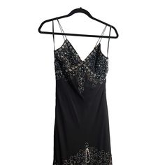 This vintage dress is a stunning piece with intricate beadwork and a timeless black color. The unique season design adds a touch of elegance to any formal occasion. Made from high-quality polyester, this dress is both comfortable and durable. It is available in a regular size type and fits perfectly for size medium. Whether you are attending a cocktail party or a formal event, this dress is perfect for any eveningwear occasion.Size MediumPit to Pit: 13.5"Length 52"-57"Waist: 15"Hip: 19" Athletic Wear Fashion, Winter Handbags, Lavender Sugar Scrub, Corporate Women, Vintage Black Dress, Essential Oils For Hair, Tea Collection, Formal Occasion, Vintage Love