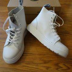 Dr Martens Mono White Leather Talib Venice Lace Up Hi Top Style Boot. New In Box, Any Marks On Sole Are From Trying On Indoors. Us Women's 6/Eu37/Uk4. True To Normal Doc Sizing. White Low-top Synthetic Boots, White Synthetic Low-top Boots, White Lace-up Sneakers With Leather Footbed, Round Toe Boots With Laces And White Sole, White Flat Heel Boots For Streetwear, White Low-top Platform Boots, White Casual Boots With Laces, Casual White Boots With Laces, White Lace-up Boots With Rubber Sole