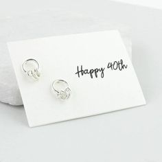 Sterling silver circle earrings displaying four circles, boxed with a message of your choice.These sweet circle earrings make a fantastic gift for anyone but are especially apt for anyone celebrating a 40th birthday. Each ring symbolises a decade and there are 4 small rings linked on a larger circle stud earring.These come with a choice of gift cards or can sit against a velvet backdrop. They will be placed in a gift box and you can choose to also have them gift wrapped.Available cards are:A cir Personalized Sterling Silver Earrings For Birthday, Personalized Silver Earrings For Birthday, Silver Hypoallergenic Earrings For Birthday Gift, Personalized Silver Earrings For Birthday Gift, Nickel-free Earrings For Birthday, Nickel-free Earrings For Birthday And Mother's Day, Velvet Backdrop, Silver Circle Earrings, Tree Of Life Earrings