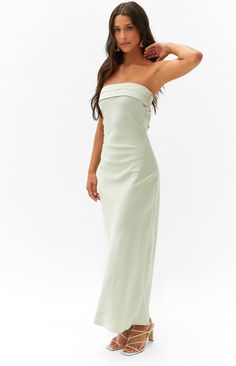 * Sage Maxi Dress 
 * Your next gorgeous cocktail () look is here! Wear this strapless satin like maxi dress () - so elegant and this colour is so chic! Slide into heels () and pop your favourite gold accessories () for your next evening fit. 
 * 
 
 * Light weight  
 * Slight stretch 
 * Lined 
 * Strapless 
 * Square neckline 
 * Maxi length 
 * Cut out on back 
 * Flowy  

 * This dress is perfect for homecoming! 

 * This is the perfect formal dress for your next event! Strapless Sage Green Dress, Sage Maxi Dress, Cocktail Look, Sage Green Dress, Prom Midi Dress, Semi Formal Dresses, Beginning Boutique, Strapless Tops, Gold Accessories