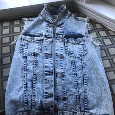 Acid Wash/ Bleached Distressed Denim Vest. Perfect Condition- Never Worn. Purchased From Boutique For $80. Light Wash Denim Vest With Frayed Hem For Summer, Light Wash Denim Vest With Frayed Hem For Spring, Medium Wash Denim Vest With Frayed Hem, Trendy Light Wash Denim Top With Frayed Hem, Summer Ripped Denim Vest In Denim Blue, Ripped Denim Blue Vest For Summer, Blue Denim Jacket With Frayed Hem For Summer, Summer Ripped Denim Blue Vest, Summer Blue Denim Jacket With Frayed Hem